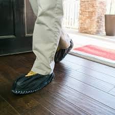 ShuBee Original Disposable, Extra-Large Boot and Shoe Covers, Thicker & Stronger, Durable Protection for Floors - 50 Pairs - color: Black