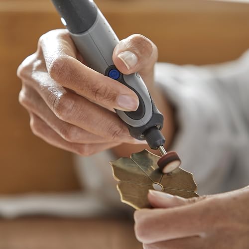 Dremel 727-01 Sanding & Grinding Rotary Tool Accessory Kit with Case, 31-Piece – Includes Grinding Stones, Sanding Bands, Cut-Off Wheel and Mandrel - style: New Model